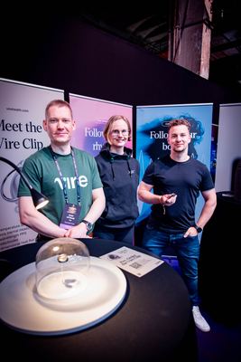 Attendees engage at the Vire booth showcasing innovative wellness technology during HOLOLIFE Summit 2025.